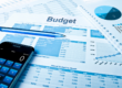 Business budget papers and calculator